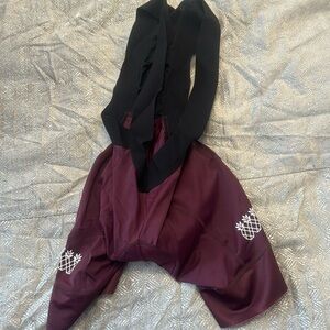 Tres Piñas burgundy bibs size small. Used a few times
